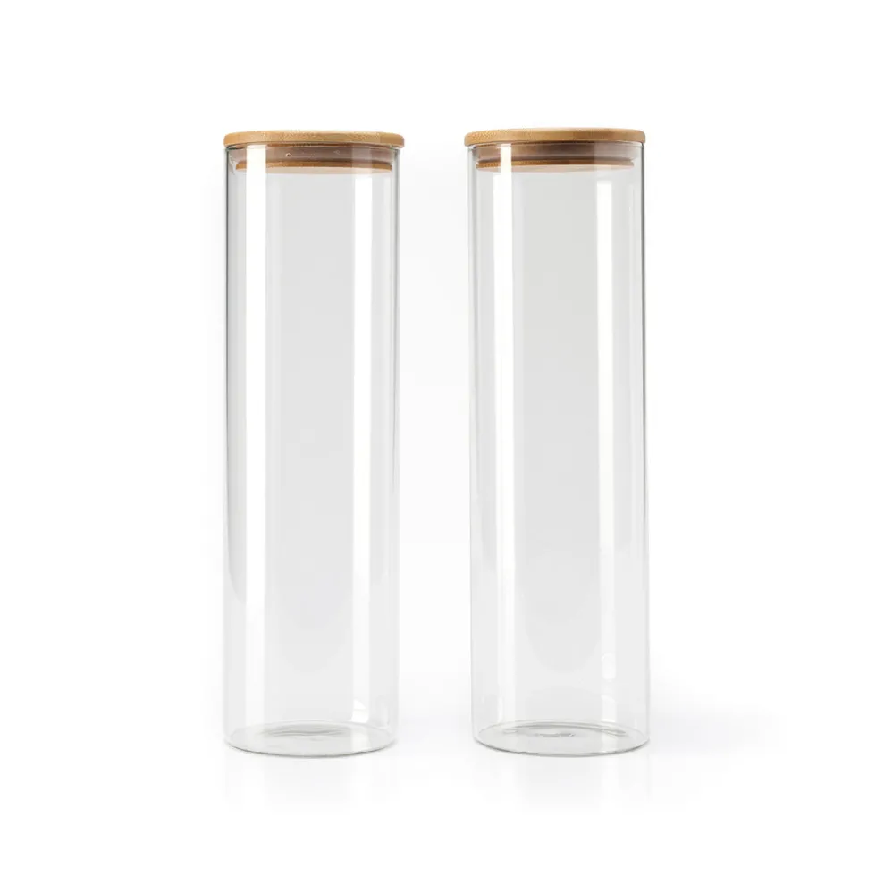 set_de__bocaux_hauts_en_v_0.webp Set de 2 bocaux hauts en verre avec couvercle en bambou – transparent*Sauter New