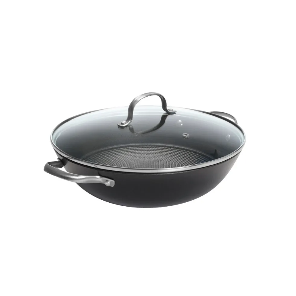 wok_en_fonte_dacier_noir__0-1.webp Wok en fonte d'acier noir avec revêtement antiadhésif en nid d'abeille avec couvercle en verre 30 cm*Kalorik Fashion